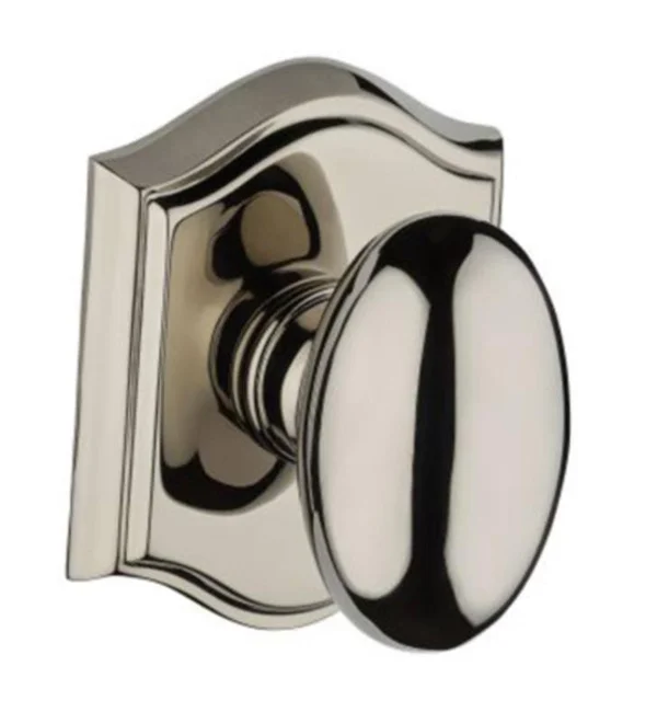 Ellipse Passage Door Knob with Traditional Arch Rose Baldwin Finish: Polished Chrome