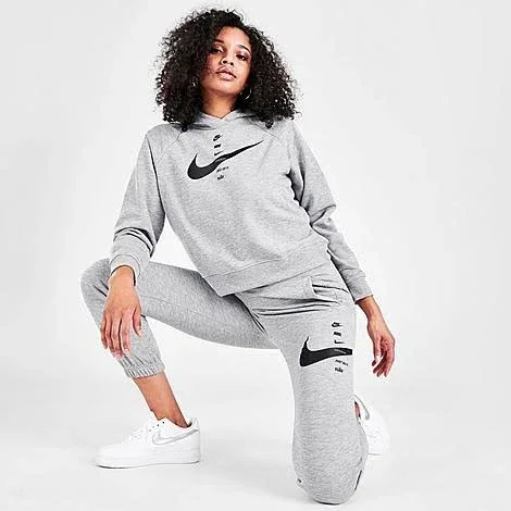 Nike Women's Sportswear Swoosh Fleece Jogger Pants in Grey/Dark Grey Heather Size Medium - Cotton/Fleece