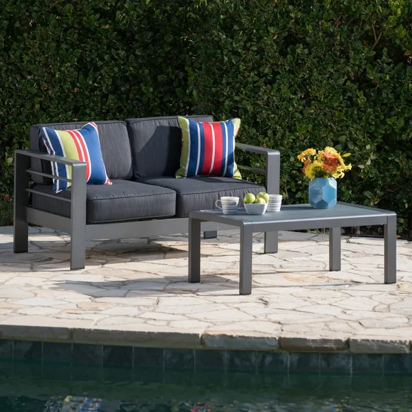 Cybele Doris Outdoor Silver Aluminum Loveseat and Coffee Table Set with Water Resistant Cushions, Light Teal