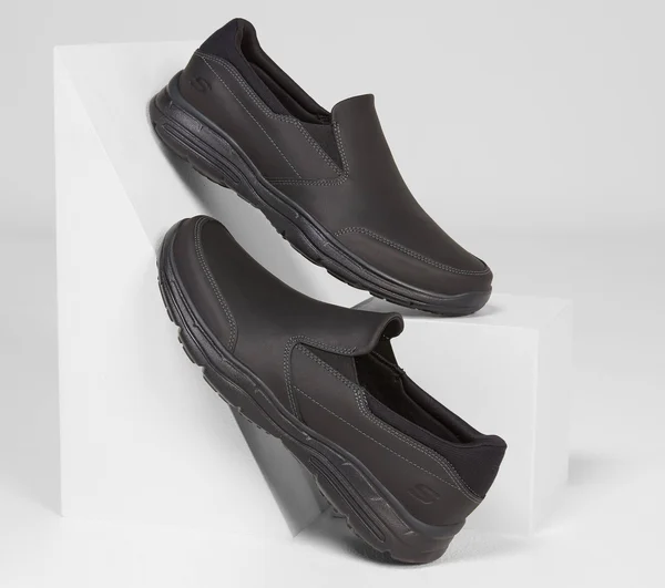 Skechers Men's Relaxed Fit Glides Calculous Slip On, Black