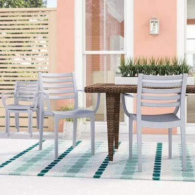 Melissus Stacking Patio Dining Armchair Mercury Row Color: Silver Gray