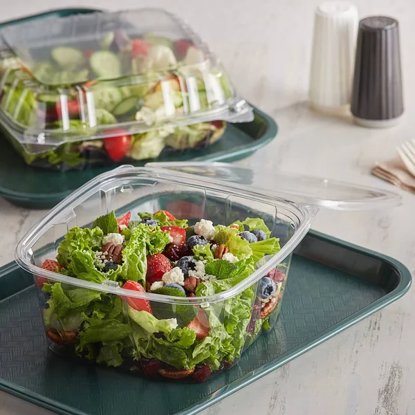 Dart CH64DEF 64 oz Tamper-Resistant Clear Hinged Container with Flat Lid (Case of 200)