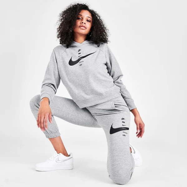 Nike Women's Sportswear Swoosh Fleece Jogger Pants in Grey/Dark Grey Heather Size Medium - Cotton/Fleece