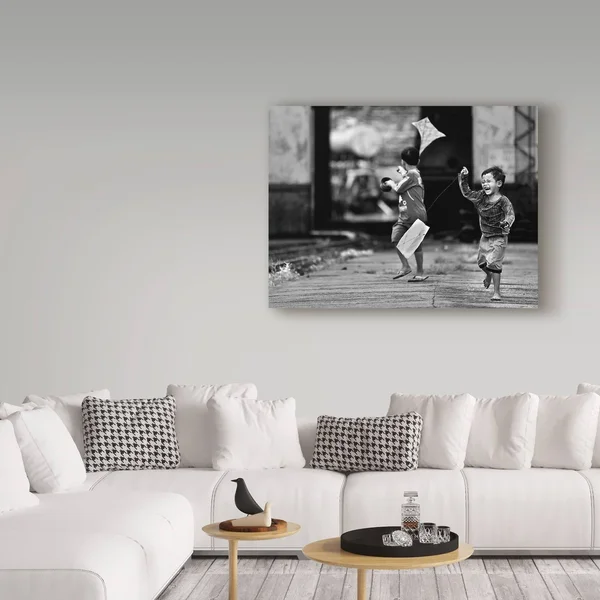 Sebastian Kisworo 'The Kite Runner' Canvas Art, Size: 18 x 24